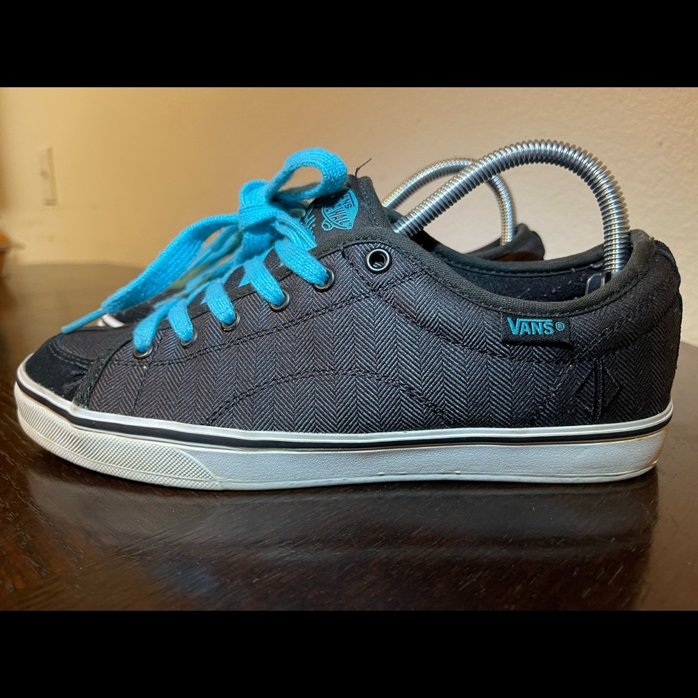light blue & black Vans.